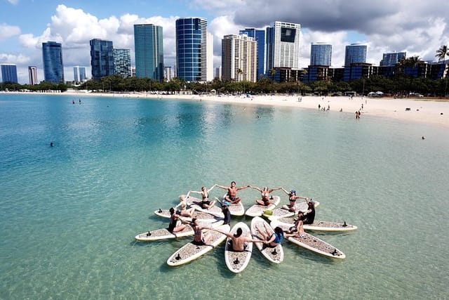 Paddleboard Yoga Class in Honolulu - Photo 1 of 7